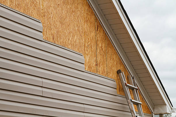 Professional Storm Damage Siding Repair technician working in Piscataway, NJ